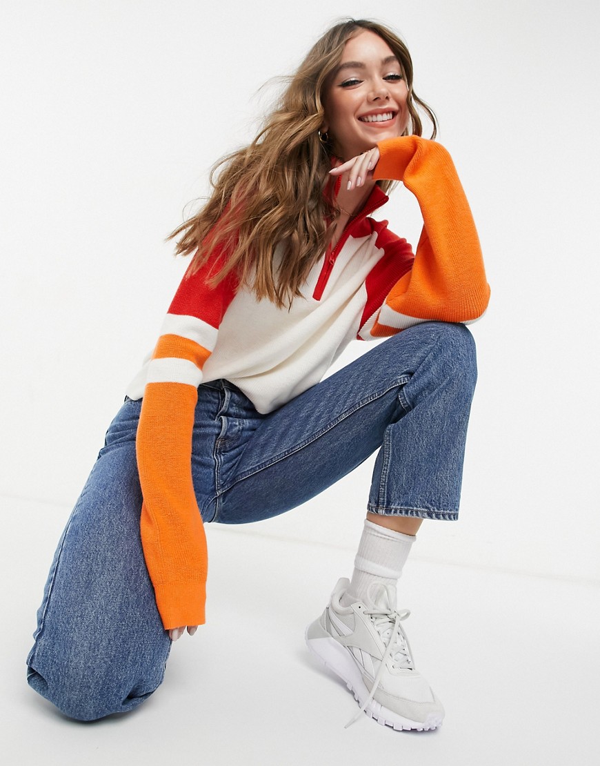 French Connection Martha sweater in white with red and orange contrast sleeves