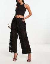 ASOS DESIGN Petite belted combat flare pants in black with contrast stitch