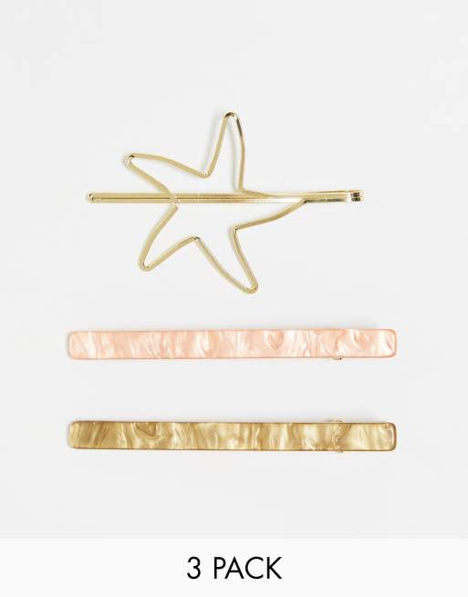  French Connection resin and star hair clip set