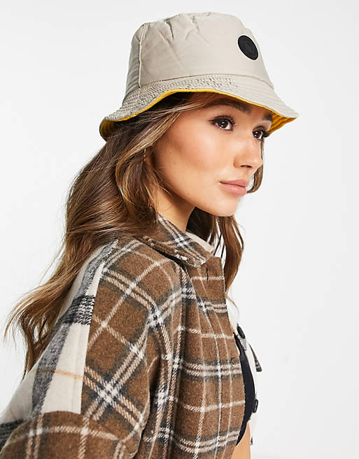 Designer Brands French Connection reversible nylon bucket hat in soft taupe and yellow 