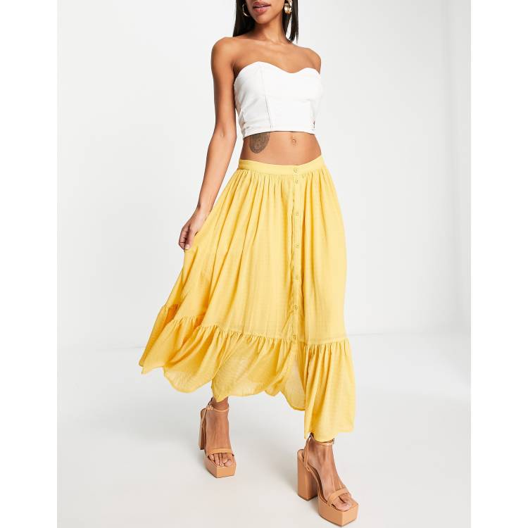 French Connection ruffle hem midi skirt in mustard ASOS