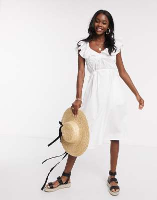 white linen ruffle dress