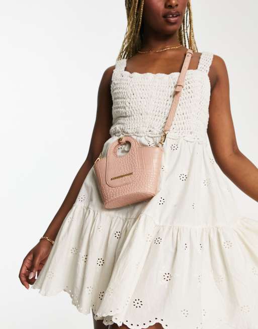 French Connection structured cross body bag with circle handle in blush pink