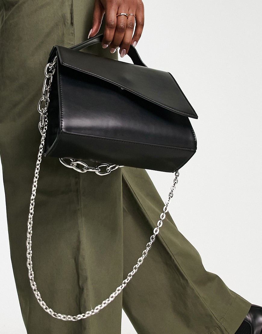 structured top handle bag with chain detail in black