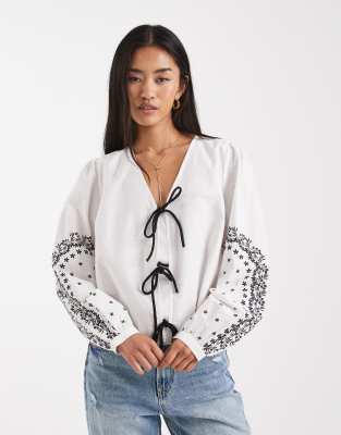 French Connection French Connection tie-detail shirt with lace printed sleeves in ivory-White