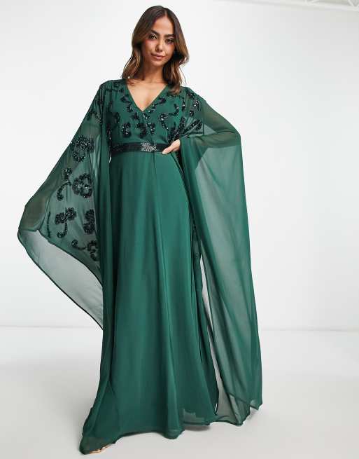 Long frock with outlet cape