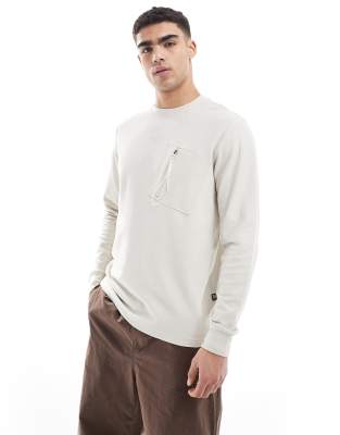 long sleeve waffle t-shirt in off white with zip patch pocket