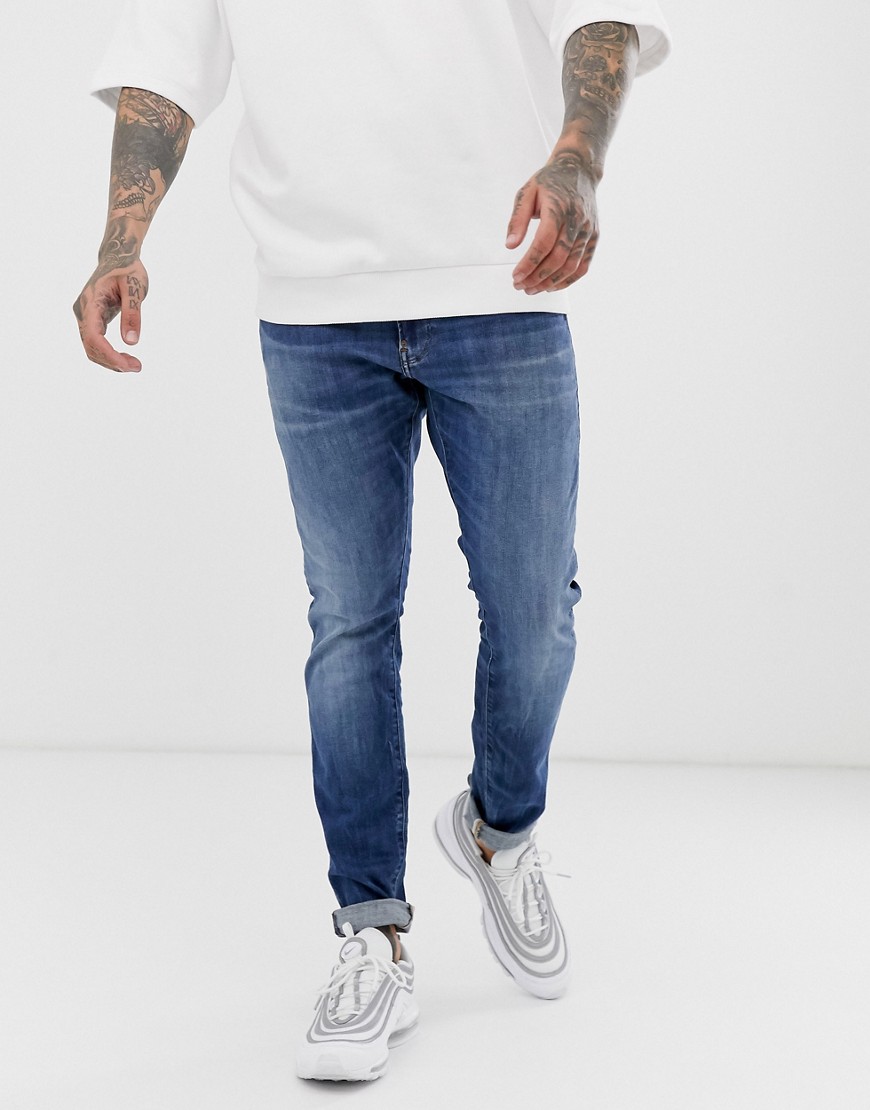G-Star – Mellanblå skinny jeans med åldrad stil