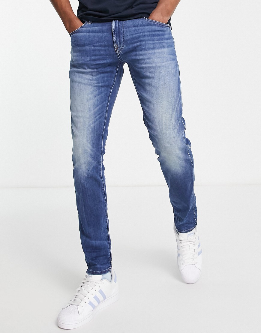 skinny fit jeans in medium aged-Blue