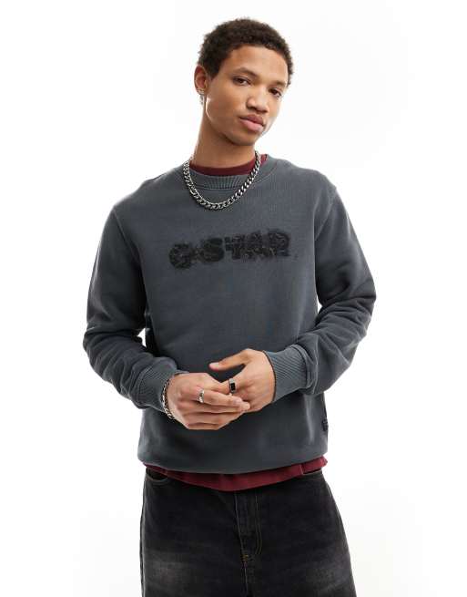 G-Star - Sweatshirt met distressed logoprint in zwart met wassing