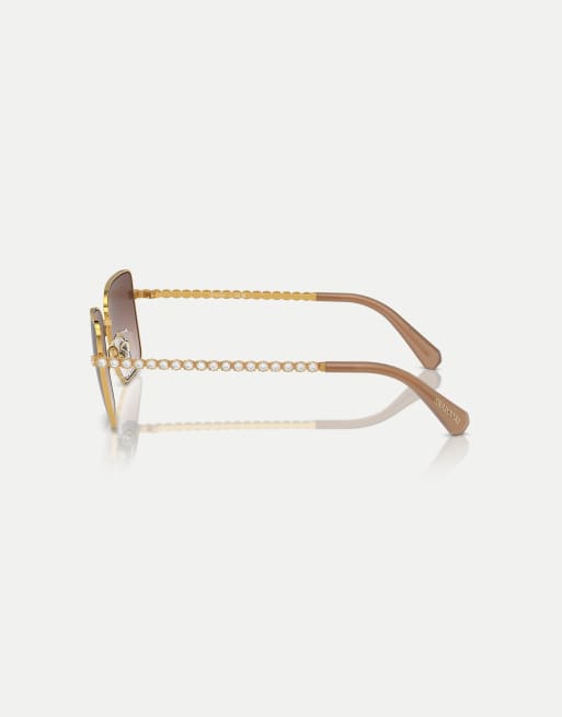 Gafas de sol amarillo dorado con montura redondeada y lentes marrones de Swarovski, 3 de 3