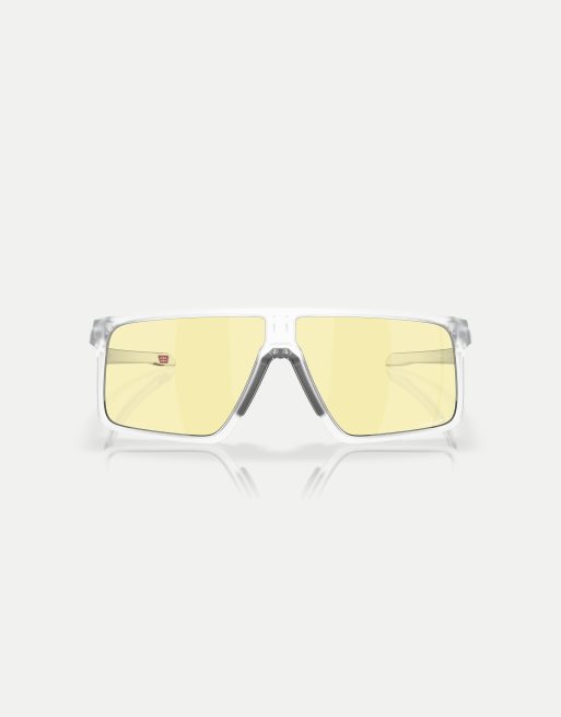 Gafas de sol blanco mate transparente con montura rectangular y lentes amarillas efecto espejo de la colección Helux Gaming de Oakley, 3 de 4