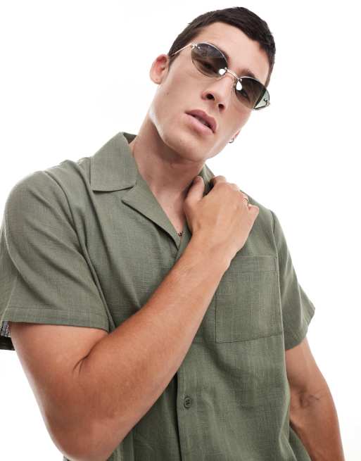 Gafas de sol doradas con montura al aire y lentes redondas de ASOS DESIGN