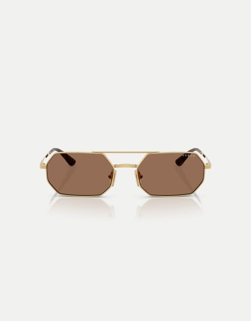 Gafas de sol doradas con montura irregular y lentes marrones de Vogue