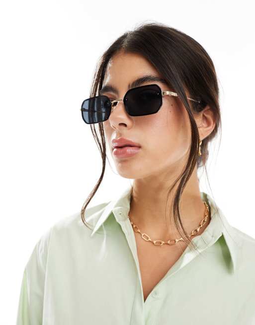 Gafas de sol doradas con montura retro y lentes negras de PIECES
