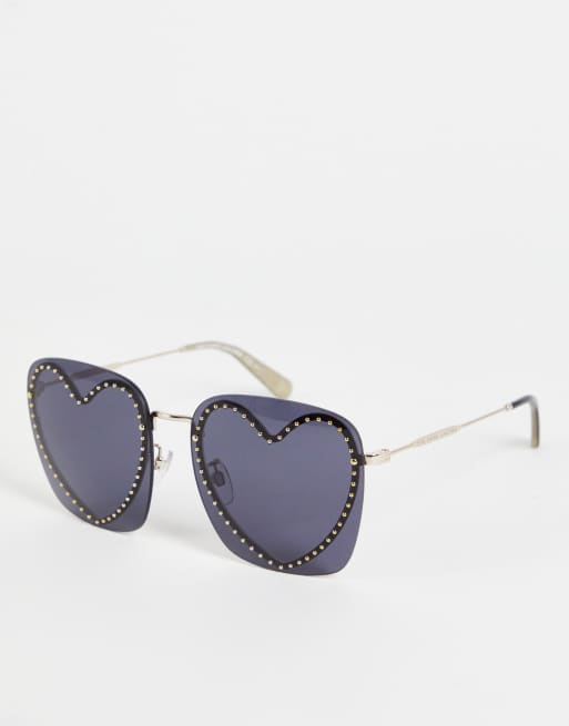 Gafas de sol doradas cuadradas con detalle de corazón de Marc Jacobs