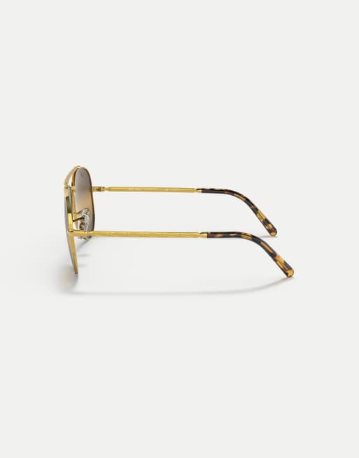 Gafas de sol doradas de estilo aviador con lentes marrones polarizadas efecto espejo New Aviator de Ray-Ban, 4 de 4