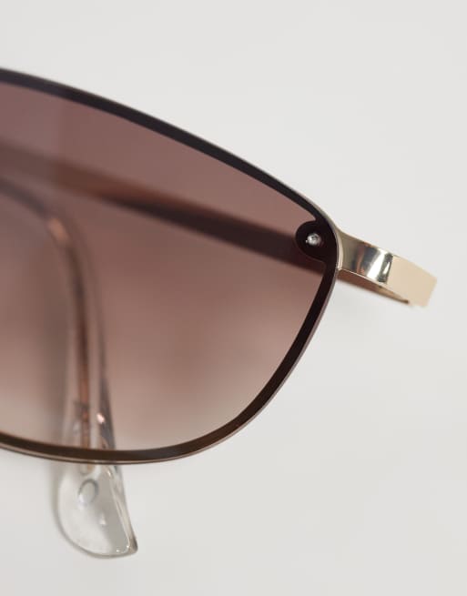 Gafas de sol doradas estrechas con montura al aire Kathie de ALDO, 2 de 3