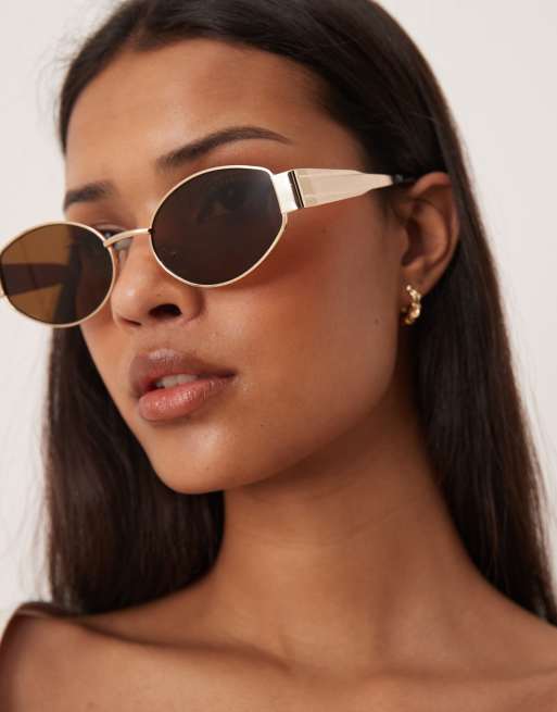 Gafas de sol doradas ovaladas de metal con lentes marrones de Gina Tricot, 3 de 3