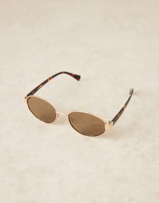 Gafas de sol doradas ovaladas de metal con patillas marrón efecto carey de ASOS DESIGN