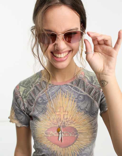 Gafas de sol dorado rosa con montura de media luna de Reclaimed