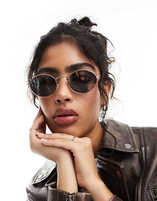 Gafas de sol dorado rosa y rosas estrechas de metal de ALDO