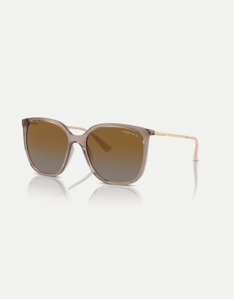 Gafas de sol marrón cristalino con montura cuadrada y lentes grises polarizadas de Vogue - view 1