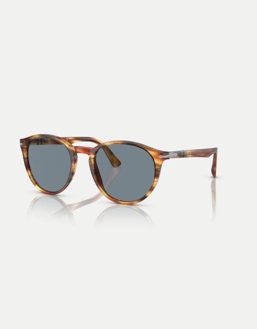 Gafas de sol marrones a rayas amarillas redondas con lentes azules PO3152S de Persol