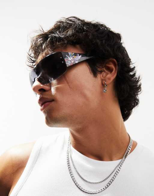 Gafas de sol negras con detalle gráfico en la patilla y montura al aire envolvente de estilo años 2000 de ASOS DESIGN