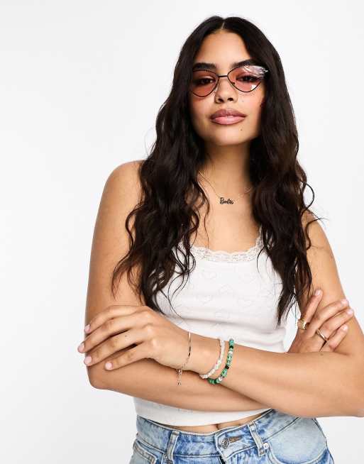Gafas de sol negras con lentes rosas y montura angular de AJ Morgan