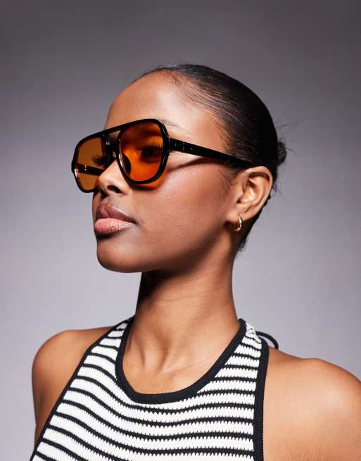 Gafas de sol negras de estilo aviador con montura fina y lentes naranjas exclusivas de Kaiia 
