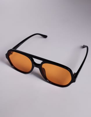 Gafas de sol negras de estilo aviador con montura fina y lentes naranjas exclusivas de Kaiia 