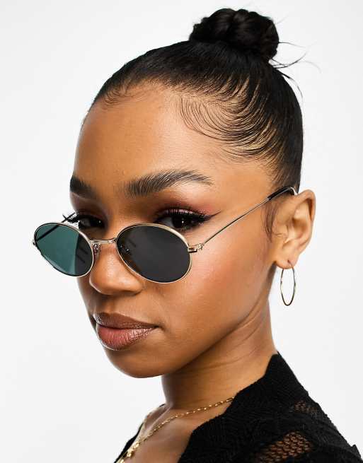 Gafas de sol negras ovaladas con montura fina y estrecha de Monki, 3 de 4