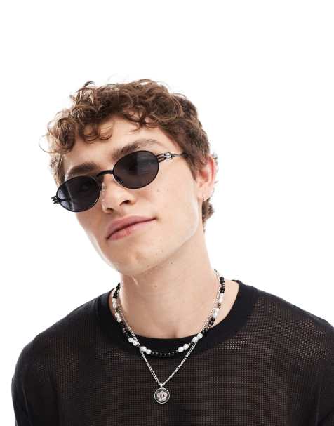 Gafas de sol negras ovaladas de estilo años 90 con detalle en las patillas de ASOS DESIGN - view 1