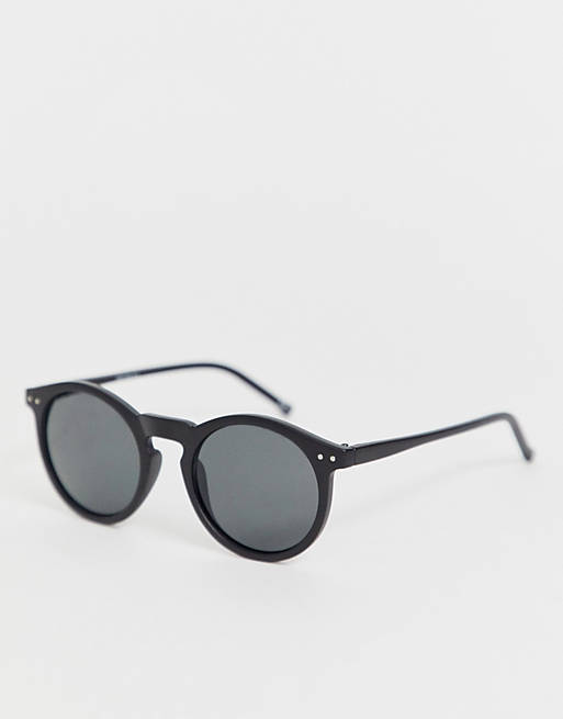 Gafas de sol redondas en plástico negro con lentes ahumadas de ASOS DESIGN