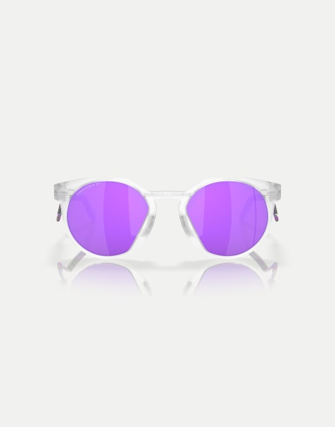 Gafas de sol transparentes redondas con acabado mate y lentes violetas efecto espejo de metal HSTN de Oakley - view 1