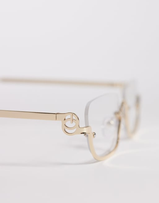 Gafas doradas con media montura y lentes transparentes exclusivas de Kaiia, 2 de 3