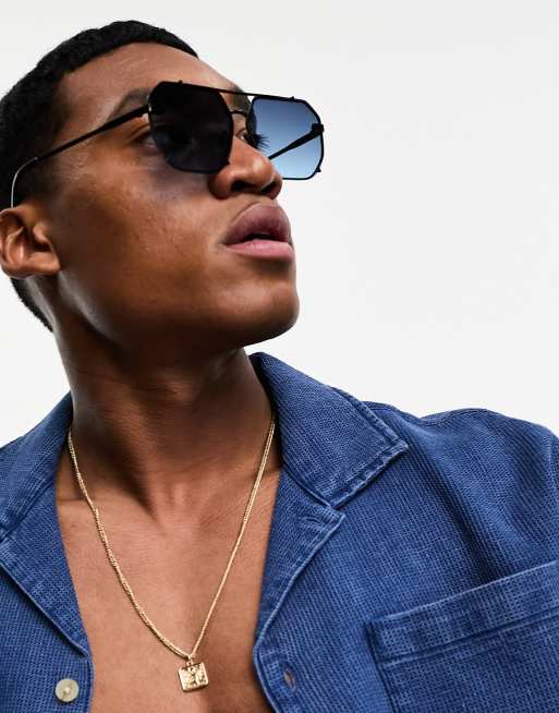 Gafas negras de estilo aviador sin montura con lentes azul oscuro
