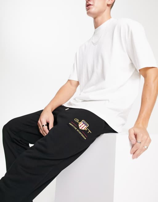 GANT - Archive - Joggers in felpa neri con logo a stemma e fondo elasticizzato