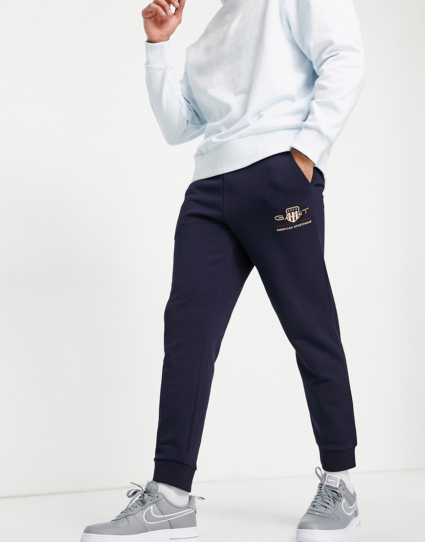 Gant archive shield embroidered logo cuffed sweatpants in evening blue navy-Blues