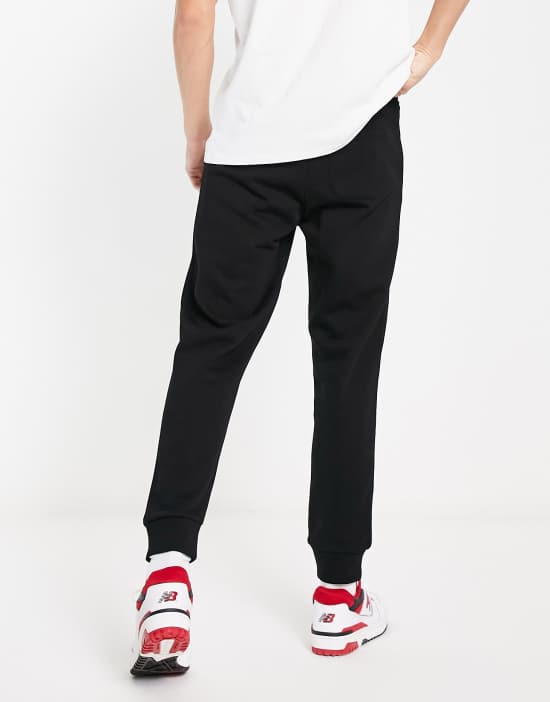 https://images.asos-media.com/products/gant-archive-shield-logo-cuffed-sweat-sweatpants-in-black/203607799-3?$n_550w$&wid=550&fit=constrain