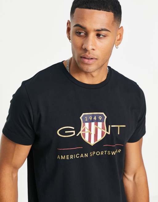 Ejendomsret Kridt Foster GANT archive shield logo T-shirt in black | ASOS