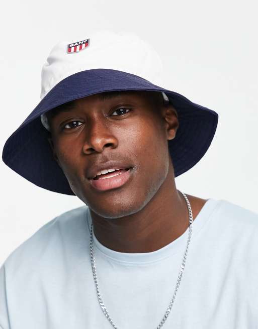 GANT bucket hat with shield logo with colour blocking in white/navy | ASOS