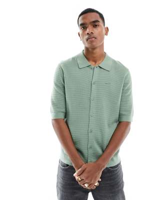 GANT button through textured cotton knit polo shirt in light green 