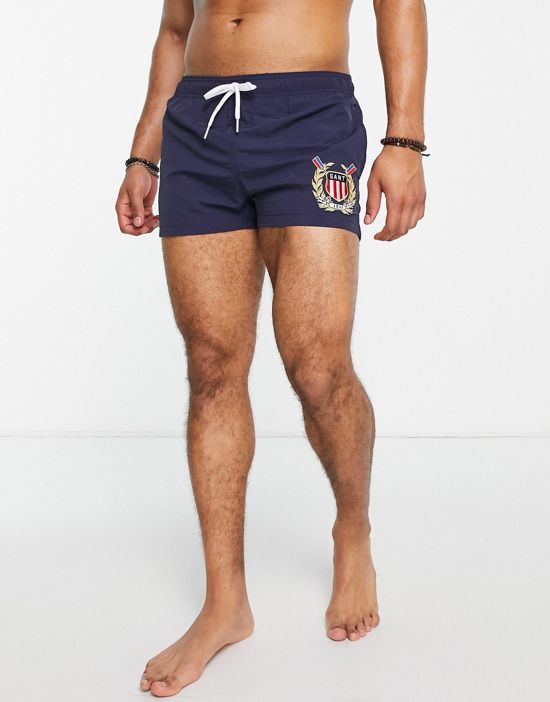 https://images.asos-media.com/products/gant-crest-embroidery-swim-shorts-in-navy/202458178-3?$n_550w$&wid=550&fit=constrain