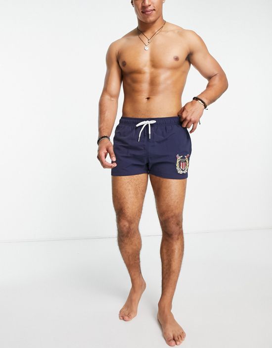 https://images.asos-media.com/products/gant-crest-embroidery-swim-shorts-in-navy/202458178-4?$n_550w$&wid=550&fit=constrain