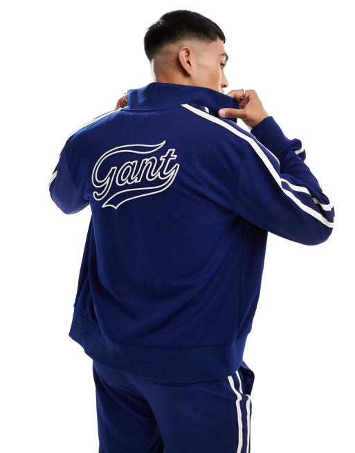 GANT - Giacca sportiva blu navy con 2 strisce e logo applicato sul retro in coordinato