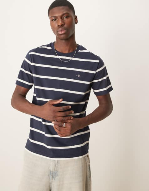 GANT – Granatowy T-shirt w paski z logo z tarczą - view 1
