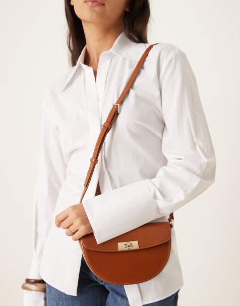 Gant leather crossbody shoulder bag with gold buckle detail in tan - view 1