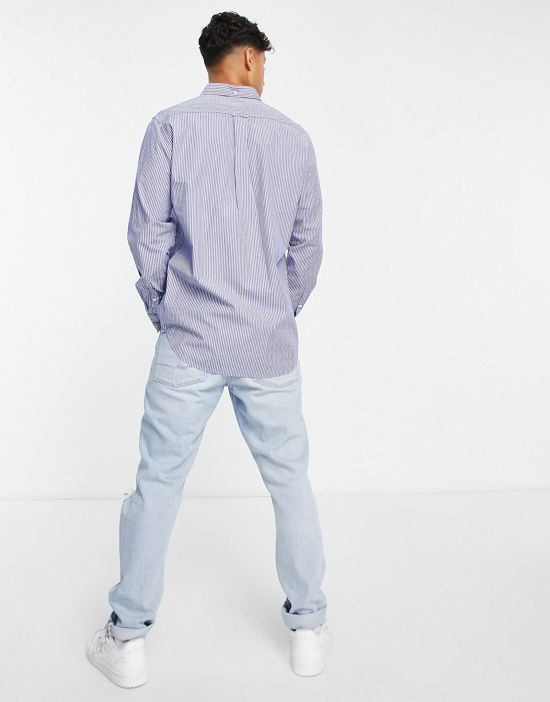 https://images.asos-media.com/products/gant-logo-pocket-regular-fit-stripe-poplin-button-down-shirt-in-blue/202832612-2?$n_550w$&wid=550&fit=constrain